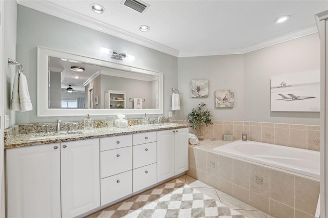 full bath with crown molding, a sink, visible vents, a bath, and a ceiling fan