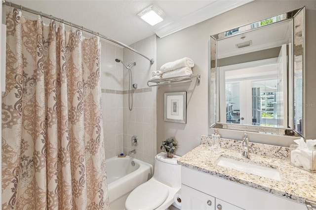 full bath featuring toilet, crown molding, shower / bathtub combination with curtain, and vanity