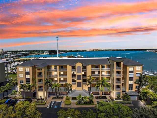 view of building exterior featuring a water view