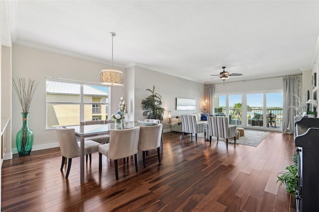 425 150th Ave Unit 2501, Madeira Beach, FL 33708 - dining area with dark wood finished floors, ceiling fan, ornamental molding, and baseboards
