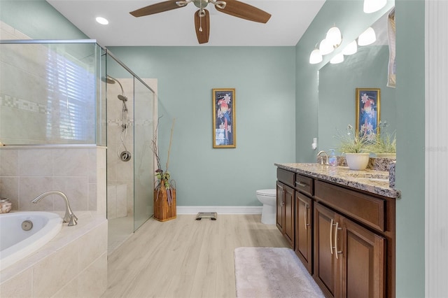 20605 Long Pond Rd, North Fort Myers, FL 33917 - full bathroom featuring vanity, a garden tub, ceiling fan, a tile shower, and baseboards