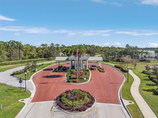 20605 Long Pond Rd, North Fort Myers, FL 33917 - view of community with curved driveway and a yard
