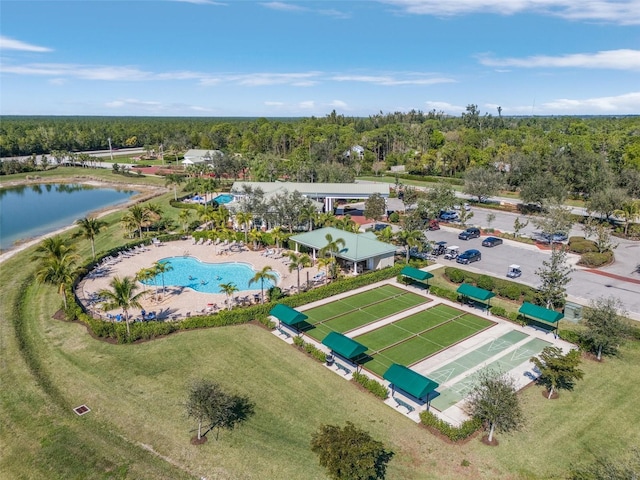 20605 Long Pond Rd, North Fort Myers, FL 33917 - aerial view of a pool, a nearby body of water, and a heavily wooded area