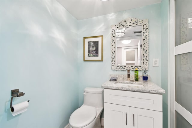5200 Brittany Dr S Unit 1502, Saint Petersburg, FL 33715 - bathroom featuring vanity, visible vents, and toilet