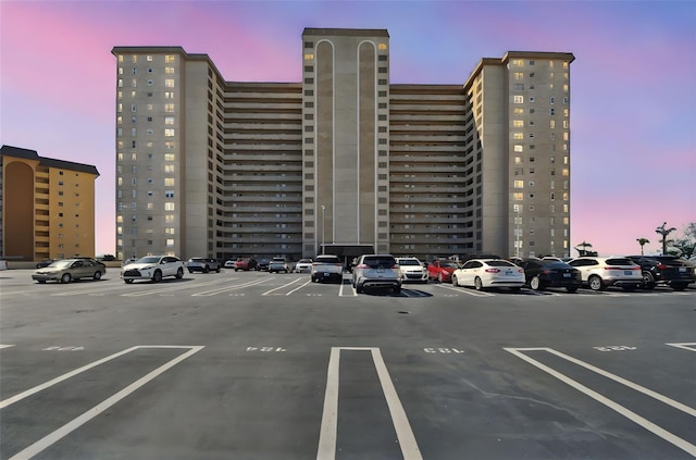 5200 Brittany Dr S Unit 1502, Saint Petersburg, FL 33715 - view of property featuring a view of city and uncovered parking