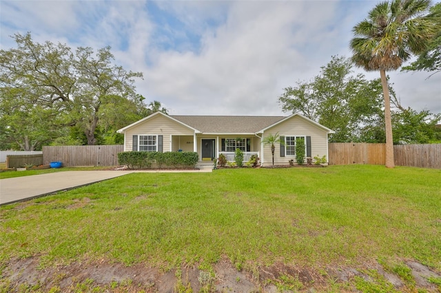 8805 Van Fleet Rd, Riverview, FL 33578 - ranch-style home with fence, a front lawn, and covered porch