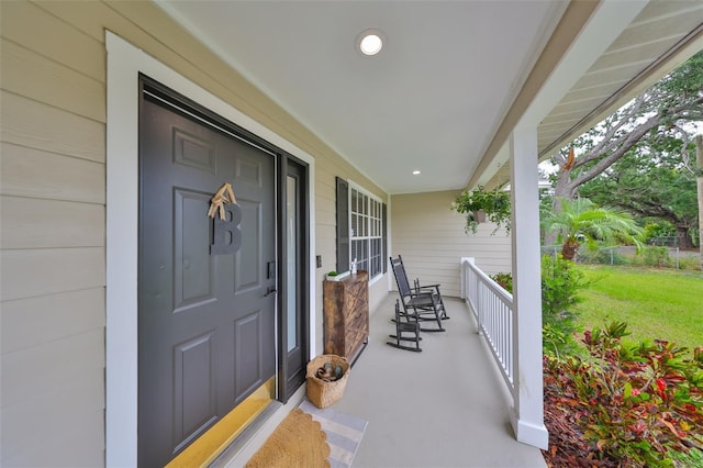 8805 Van Fleet Rd, Riverview, FL 33578 - doorway to property with a lawn and covered porch
