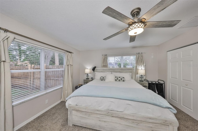 8805 Van Fleet Rd, Riverview, FL 33578 - bedroom with ceiling fan, a textured ceiling, visible vents, carpet flooring, and baseboards