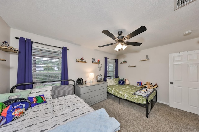 8805 Van Fleet Rd, Riverview, FL 33578 - carpeted bedroom with visible vents, a textured ceiling, and ceiling fan
