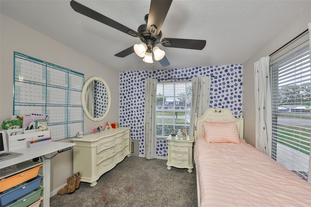 8805 Van Fleet Rd, Riverview, FL 33578 - bedroom featuring access to exterior, dark carpet, and a ceiling fan