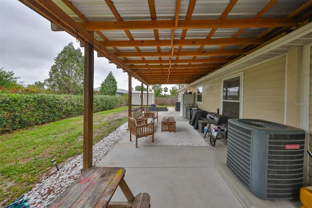 8805 Van Fleet Rd, Riverview, FL 33578 - view of patio featuring an outdoor structure, grilling area, a shed, central AC unit, and fence