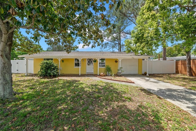 ranch-style house with a gate, concrete driveway, a garage, and fence