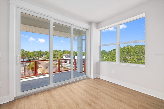 11 29th St N, Saint Petersburg, FL 33713 - doorway featuring light wood-style floors and baseboards