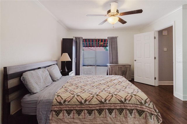 bedroom featuring baseboards, crown molding, dark wood-style floors, and ceiling fan