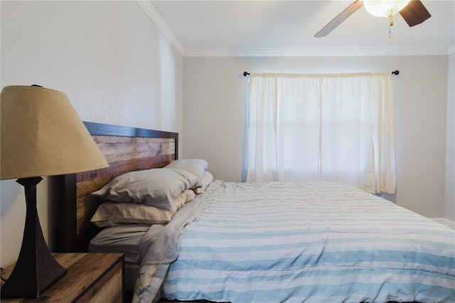 bedroom featuring crown molding and ceiling fan