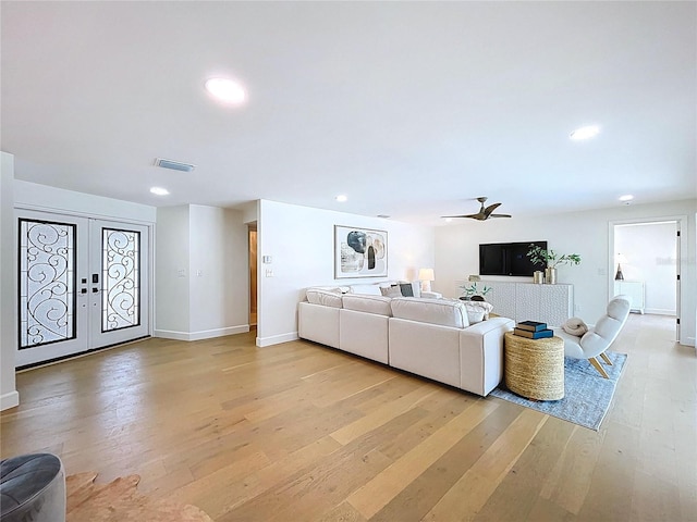 773 Snug Is, Clearwater Beach, FL 33767 - living area featuring light wood finished floors, a ceiling fan, recessed lighting, baseboards, and french doors