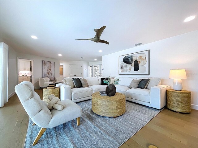 773 Snug Is, Clearwater Beach, FL 33767 - living room with light wood finished floors, recessed lighting, baseboards, and a ceiling fan