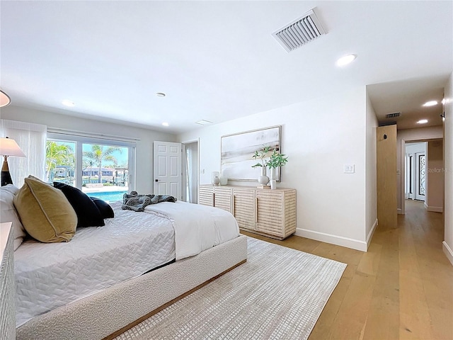 773 Snug Is, Clearwater Beach, FL 33767 - bedroom featuring light wood-style floors, baseboards, access to outside, and recessed lighting
