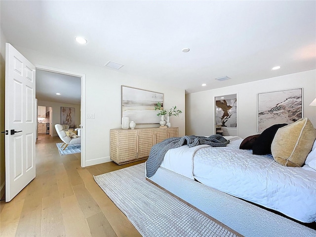 773 Snug Is, Clearwater Beach, FL 33767 - bedroom with light wood-style floors, recessed lighting, and baseboards