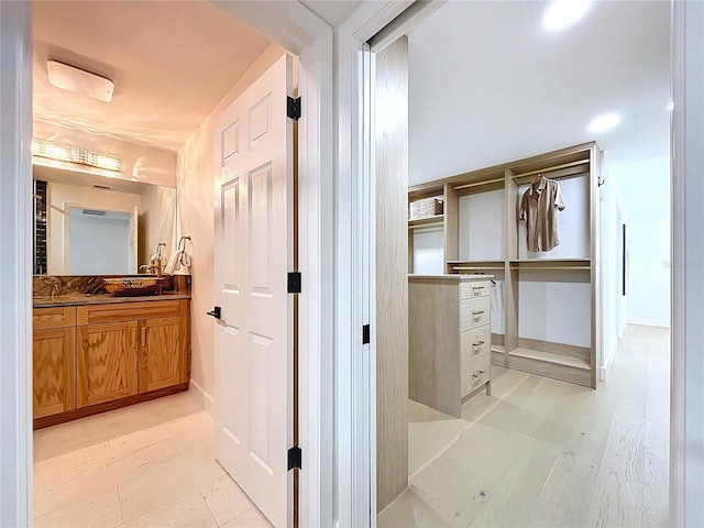 773 Snug Is, Clearwater Beach, FL 33767 - bathroom featuring vanity and baseboards