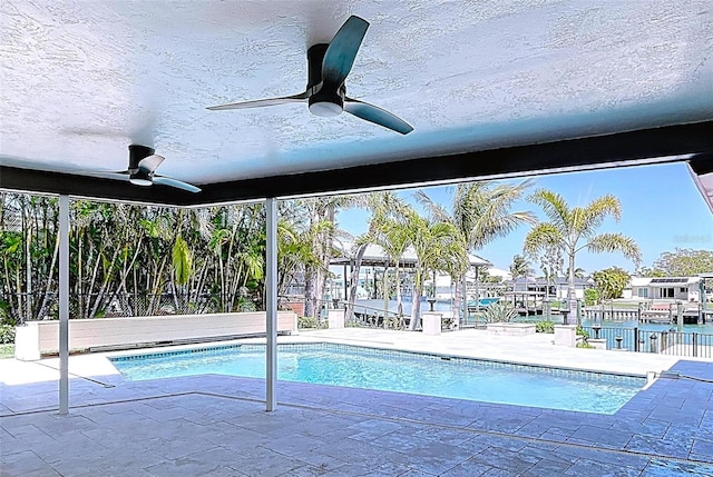 773 Snug Is, Clearwater Beach, FL 33767 - swimming pool with ceiling fan and a patio area