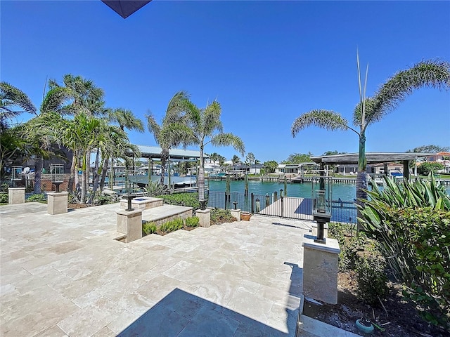 773 Snug Is, Clearwater Beach, FL 33767 - view of community featuring a water view and a dock