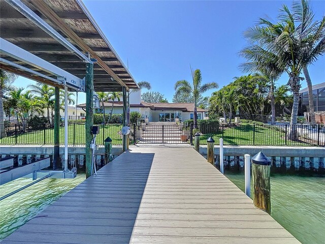 773 Snug Is, Clearwater Beach, FL 33767 - dock featuring a water view