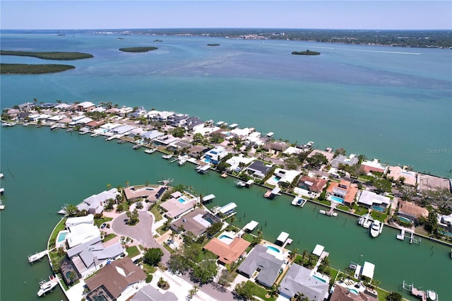 773 Snug Is, Clearwater Beach, FL 33767 - aerial view of property and surrounding area featuring a nearby body of water and nearby suburban area