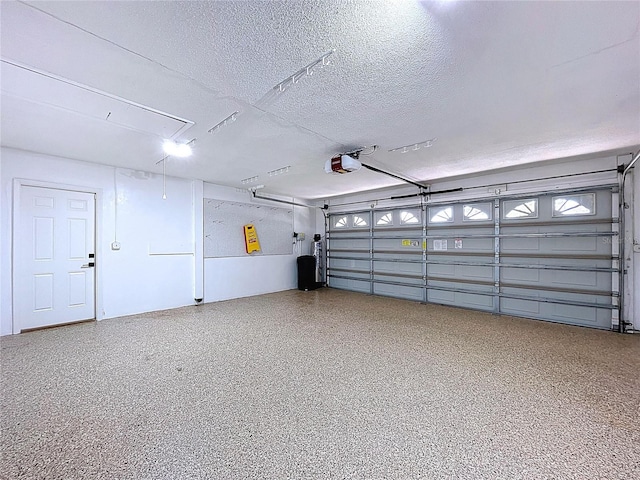 773 Snug Is, Clearwater Beach, FL 33767 - garage featuring a garage door opener