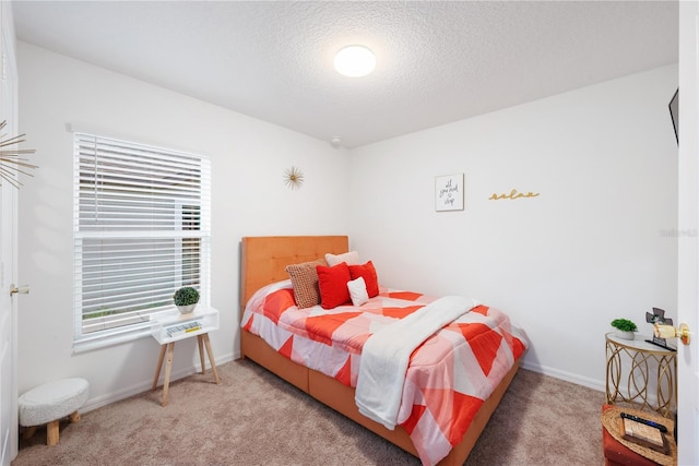 8975 Southern Charm Cir, Brooksville, FL 34613 - carpeted bedroom with a textured ceiling and baseboards