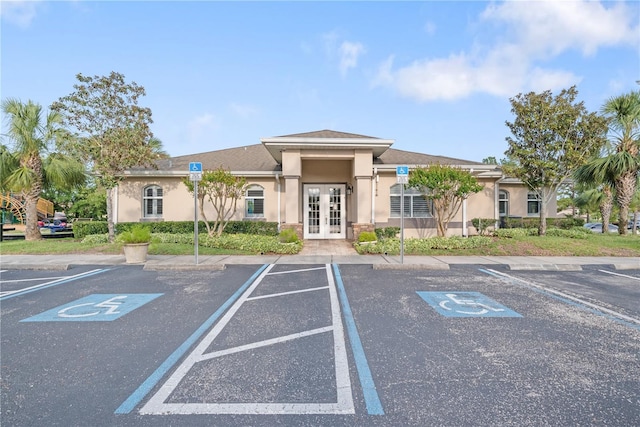 8975 Southern Charm Cir, Brooksville, FL 34613 - view of building exterior with uncovered parking