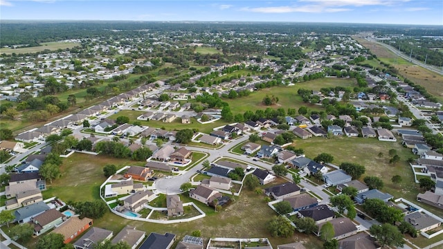 8975 Southern Charm Cir, Brooksville, FL 34613 - drone / aerial view with a residential view