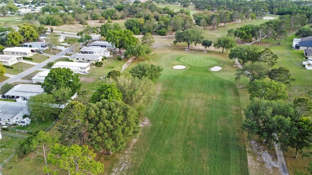 8975 Southern Charm Cir, Brooksville, FL 34613 - birds eye view of property featuring golf course view and a residential view