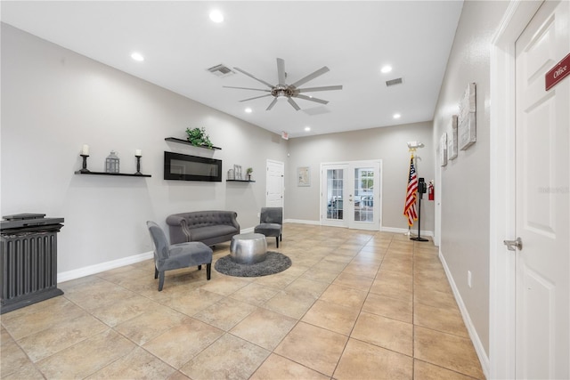 8975 Southern Charm Cir, Brooksville, FL 34613 - sitting room featuring ceiling fan, french doors, recessed lighting, and visible vents