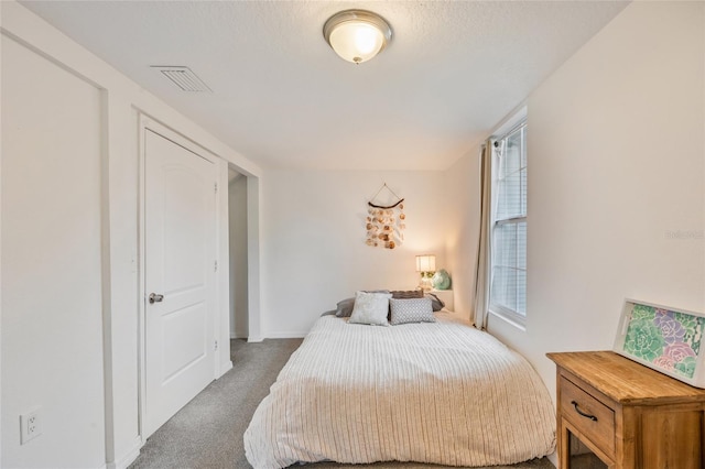 105 W Columbus Dr, Tampa, FL 33602 - carpeted bedroom with visible vents and baseboards