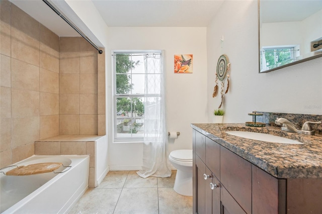 105 W Columbus Dr, Tampa, FL 33602 - full bathroom featuring toilet, vanity, a washtub, and a wealth of natural light