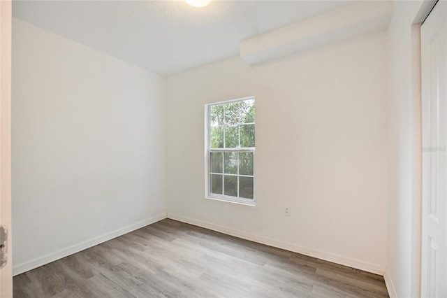 105 W Columbus Dr, Tampa, FL 33602 - unfurnished room with wood finished floors and baseboards