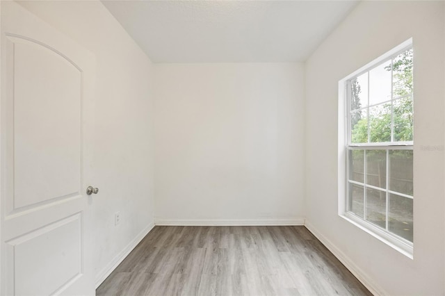 105 W Columbus Dr, Tampa, FL 33602 - unfurnished room with light wood-style floors and baseboards