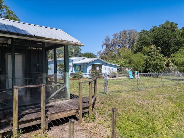 17111 Mockingbird Ln, Lutz, FL 33548 - view of yard with fence and a sunroom