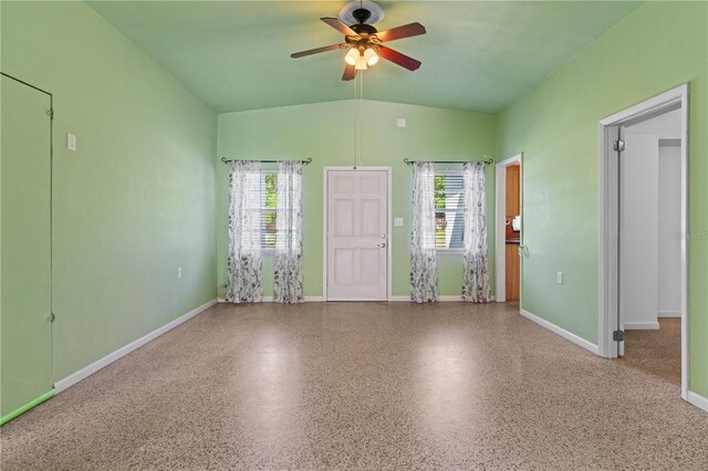 17111 Mockingbird Ln, Lutz, FL 33548 - unfurnished room with speckled floor, a wealth of natural light, and a ceiling fan