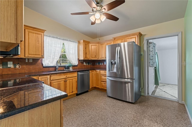 17111 Mockingbird Ln, Lutz, FL 33548 - kitchen with a sink, decorative backsplash, appliances with stainless steel finishes, and a ceiling fan