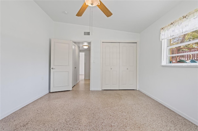 17111 Mockingbird Ln, Lutz, FL 33548 - unfurnished bedroom with visible vents, baseboards, speckled floor, and a closet