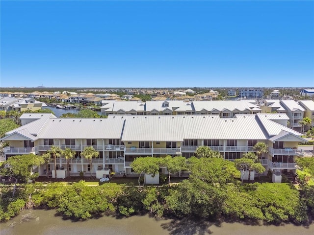 456 Bahia Beach Blvd, Ruskin, FL 33570 - drone / aerial view featuring a water view and a residential view