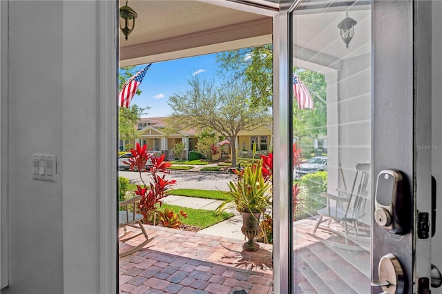 10011 Parley Dr, Tampa, FL 33626 - entryway featuring brick floor