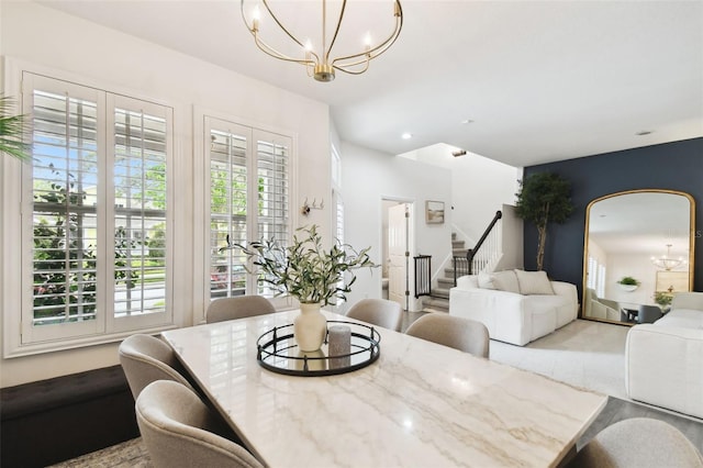 10011 Parley Dr, Tampa, FL 33626 - dining room featuring recessed lighting, an inviting chandelier, a wealth of natural light, and stairway