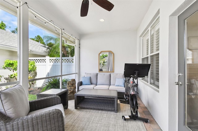 10011 Parley Dr, Tampa, FL 33626 - sunroom featuring an outdoor living space and ceiling fan