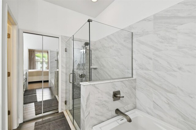 10011 Parley Dr, Tampa, FL 33626 - ensuite bathroom with a shower stall, ensuite bath, and a washtub