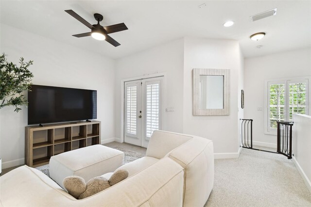 10011 Parley Dr, Tampa, FL 33626 - living area featuring visible vents, baseboards, and light colored carpet
