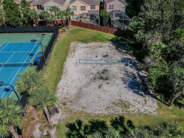 10011 Parley Dr, Tampa, FL 33626 - view of yard with a tennis court, a residential view, and fence