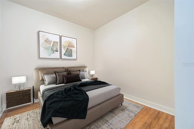 1120 E Kennedy Blvd Unit 615, Tampa, FL 33602 - bedroom with wood finished floors and baseboards